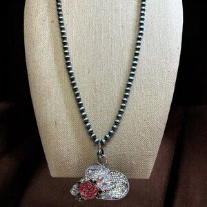 Navajo style beads with rhinestone cowgirl hat pendant
